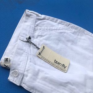 White “Born Fly” shorts
